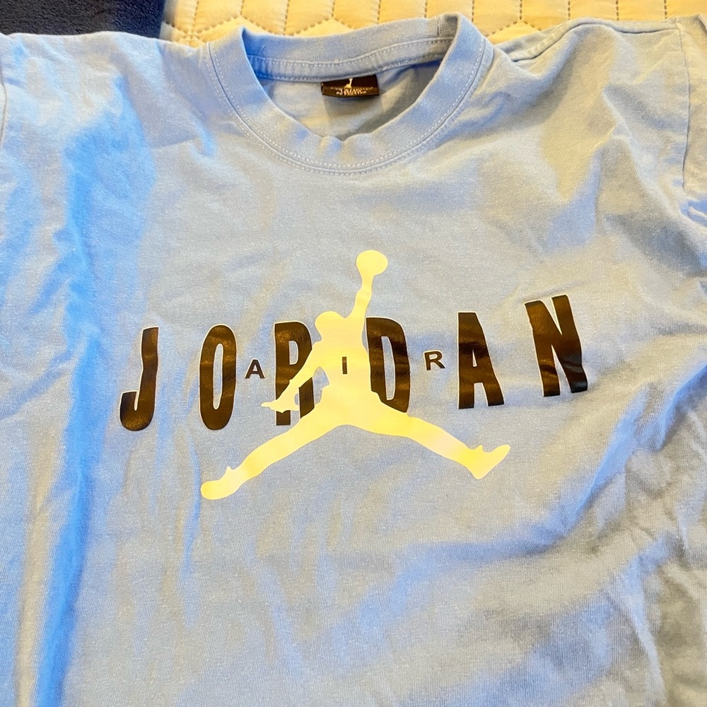 Jordan size medium Blue T-Shirt baby blue and dry cleaned. Beautiful!